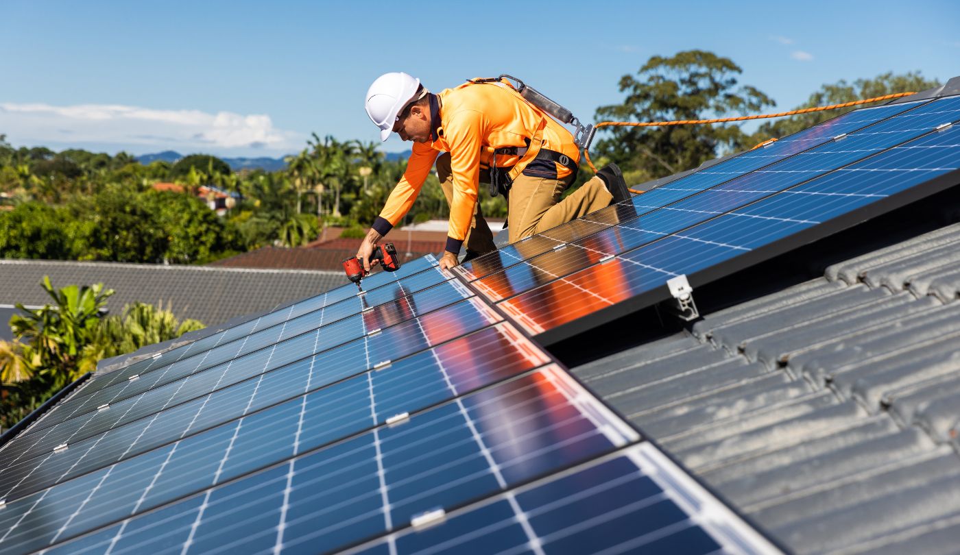 Before and after images of solar panel detach and reset service during roof restoration