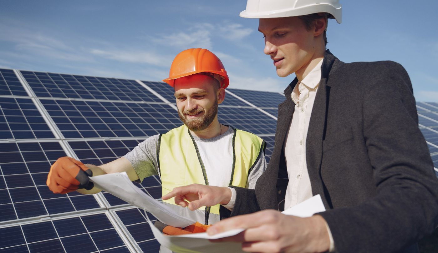 solar panel technicians checking the solar panel status